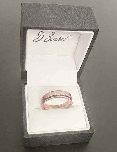 Flat and wide pink gold and black diamonds eternity band for men.