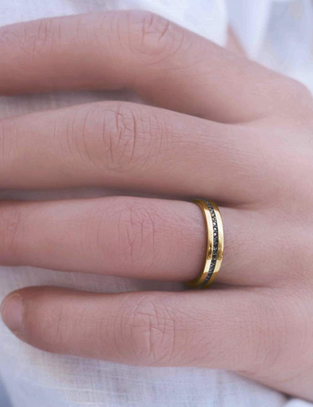 D.Bachet yellow gold ring with hand-set diamond, refined French jewelry design.