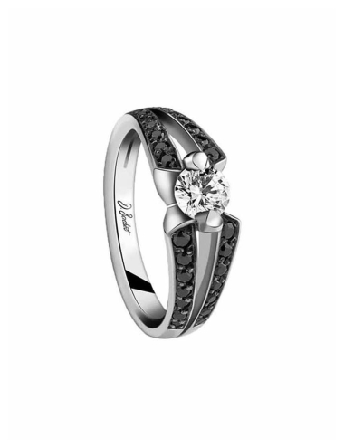 Original engagement ring set with a 0.50 carat white diamond and black diamonds