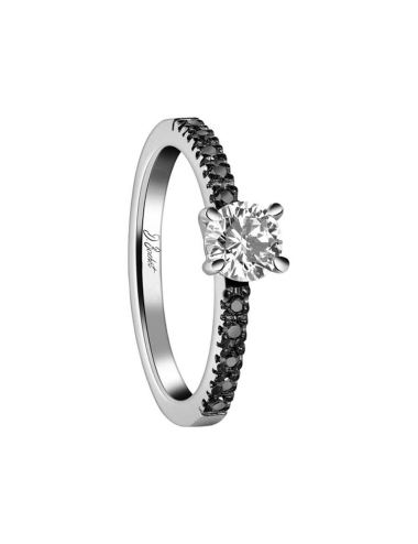 Engagement ring for women set with a 0.50 carat brillant cut white diamond and prong set black diamonds