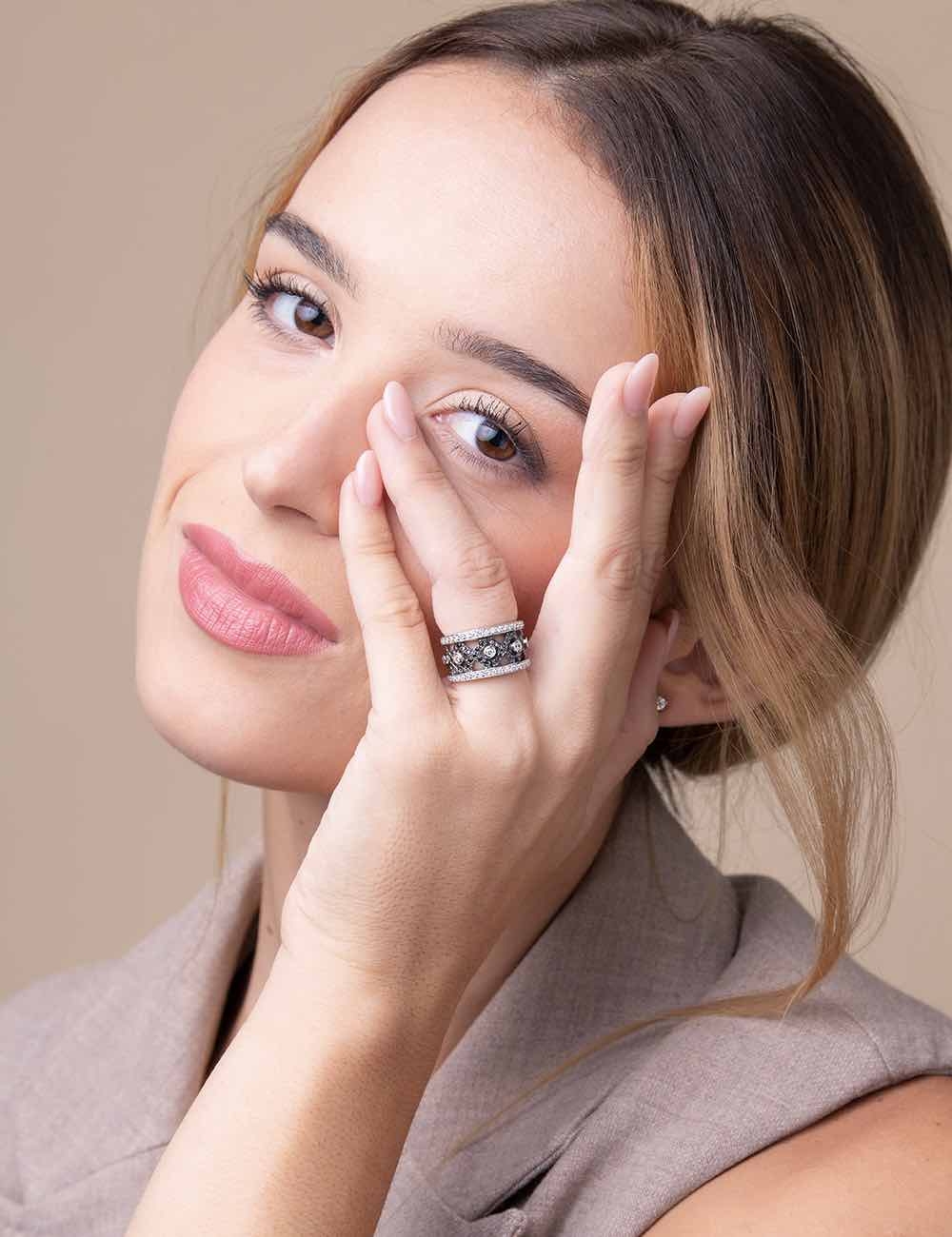 Unique and ultra modern women's ring in platinum, white diamonds and black diamonds