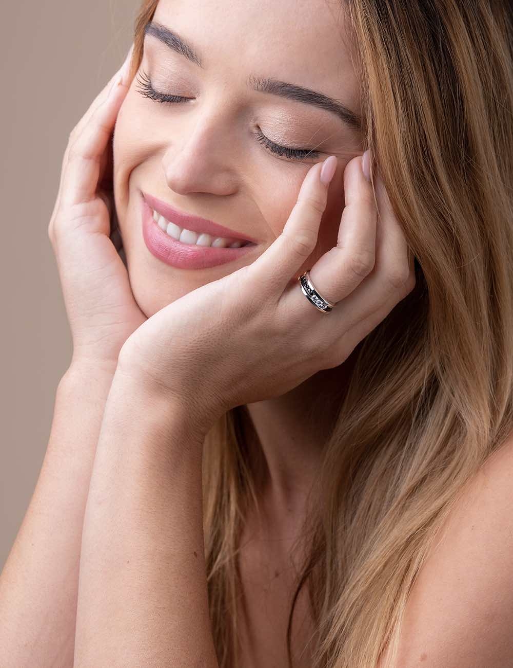 D.Bachet Trilogy ring featuring a trio of white diamonds surrounded by black diamond pavé, epitome of luxury and elegance.