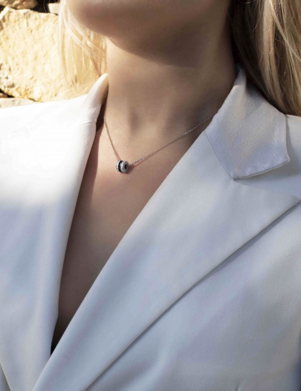 Scroll in Love white gold pendant with contrasting black & white diamonds.