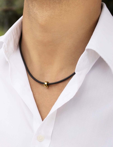 Pendant for men to wear every day in 18k yellow gold and black diamonds on a black silicone cord
