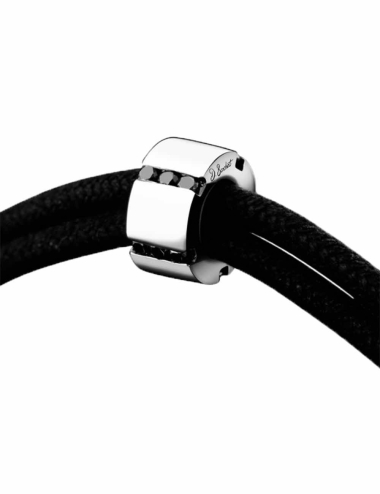 A modern bracelet for men in white gold 18k and black diamonds on a black cord with sliding knots