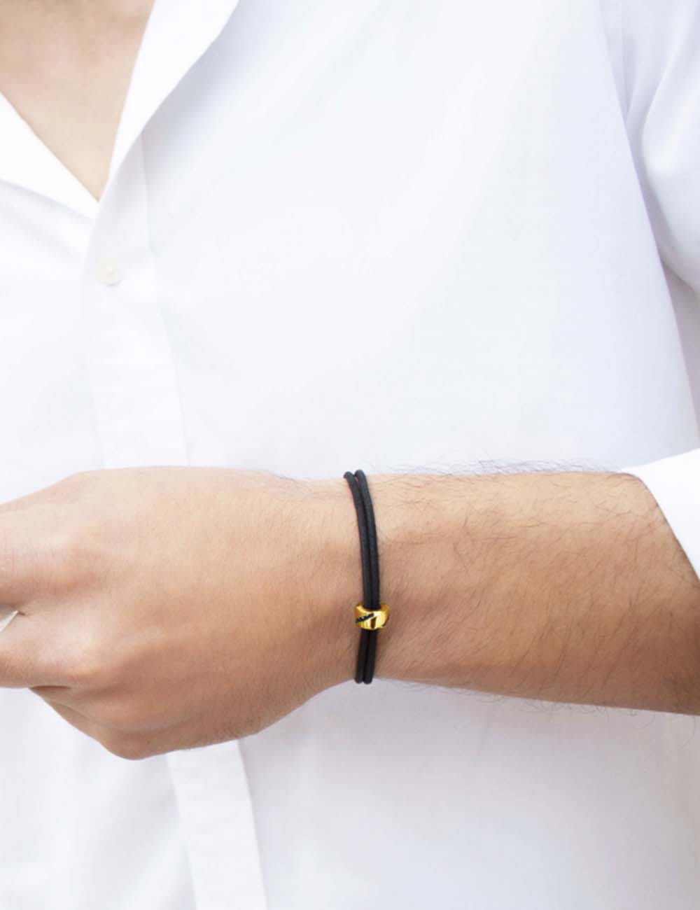 Bracelet for men to match any outfit in yellow gold 18k and black diamonds on an adjustable black cord