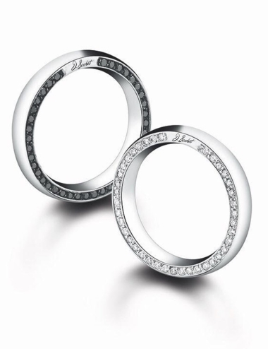 Wedding ring for men and women set on both sides with white diamonds and black diamonds