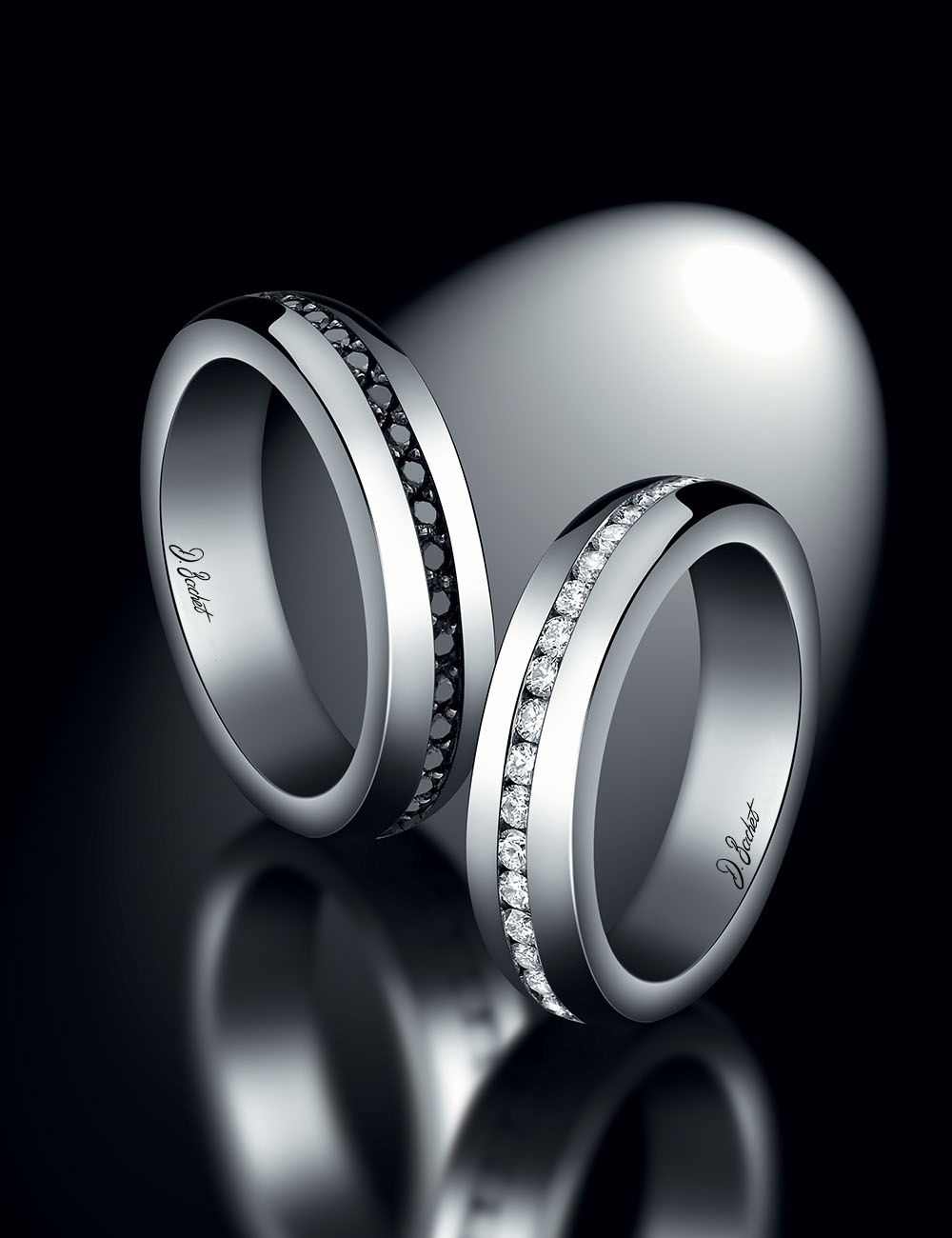 Men's D.Bachet wedding band, traditional with central line of black diamonds, in platinum.