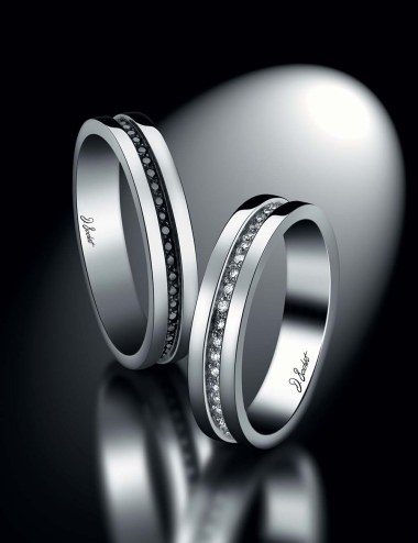 Matching eternity wedding bands for couple set with white diamonds and black diamonds