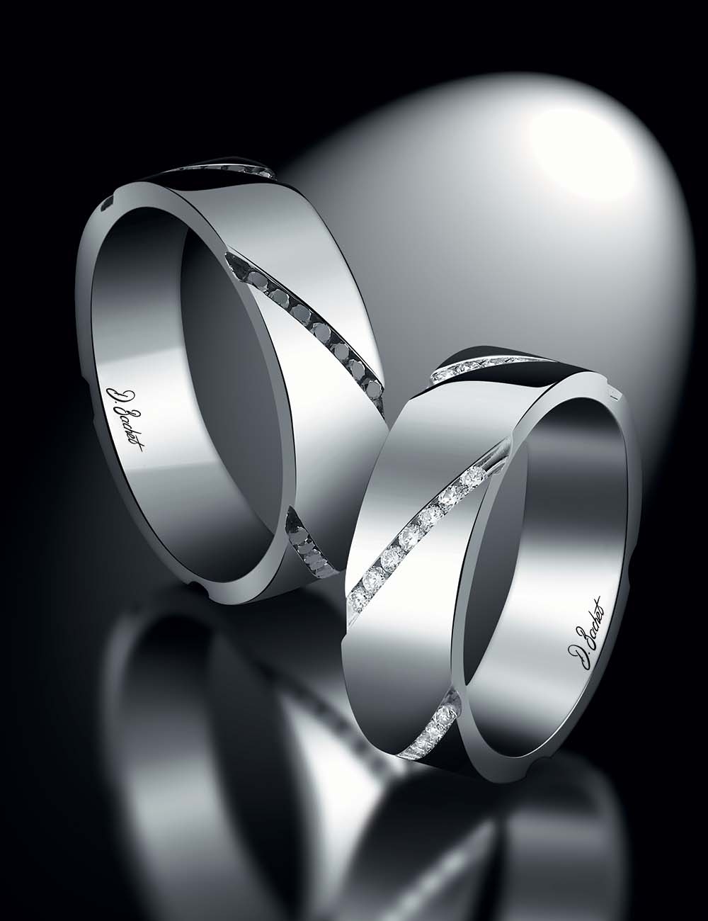 Avant-garde women's wedding band in platinum, gold with diagonal white diamonds, geometric design, also in black diamonds.