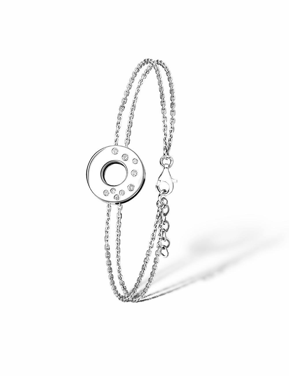 ChatGPT
Un bracelet féminin en or blanc formant un cercle, orné d'une série de diamants blancs disposés en cascade.