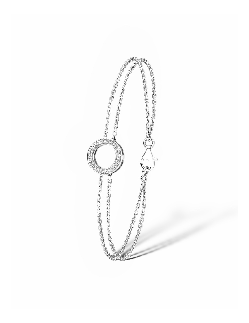 Un bracelet pour femme en forme de cercle, fabriqué en or blanc 750 et orné de diamants blancs.