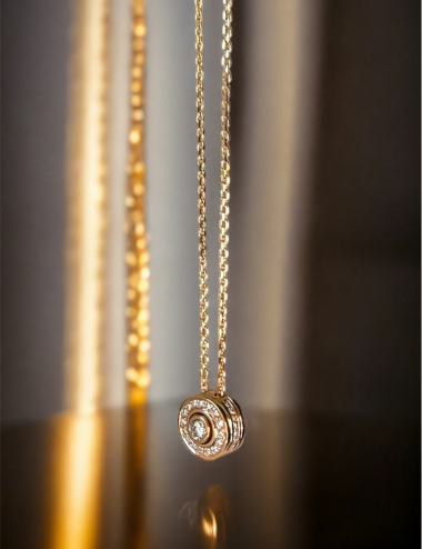 Elegant necklace featuring a 0.20 carat white diamond with a diamond halo and life flower pattern on the back.