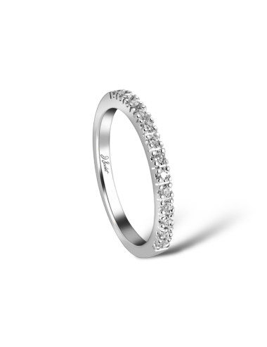 Women's platinum wedding band with white diamonds in a half-eternity setting, claw-set, creating a refined sparkle.