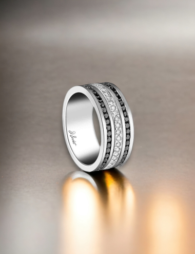 Unisex 'Latitude' ring, with its distinctive design blending black and white diamonds.