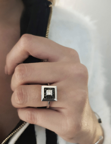 Select Ring: Luxury meets boldness, princess-cut diamond, black diamond accents, symbolizing modern woman's elegance.