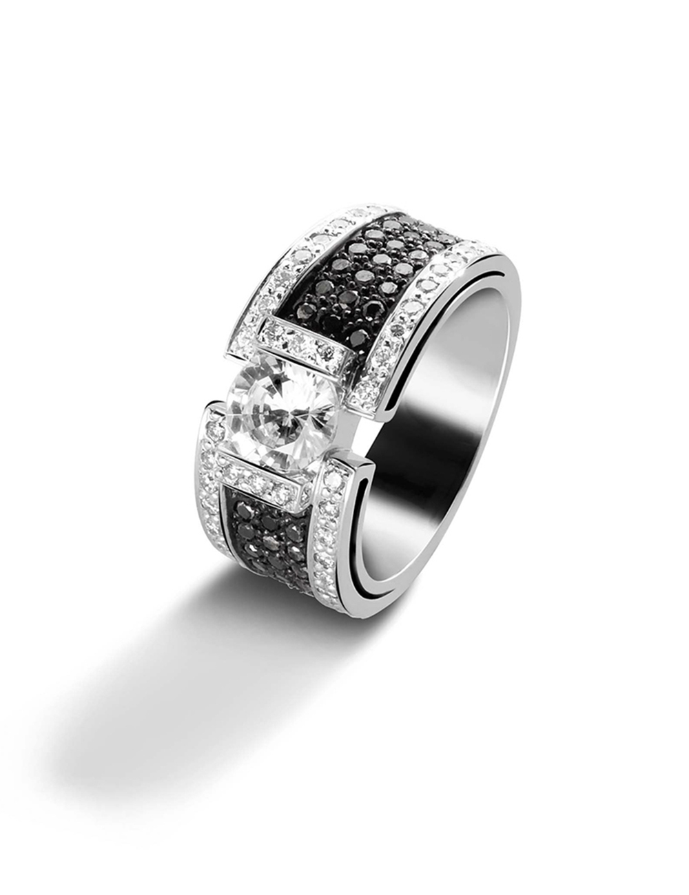 Modern luxury women's ring with a 1-carat center brilliant-cut white diamond and pavé of white and black diamonds.
