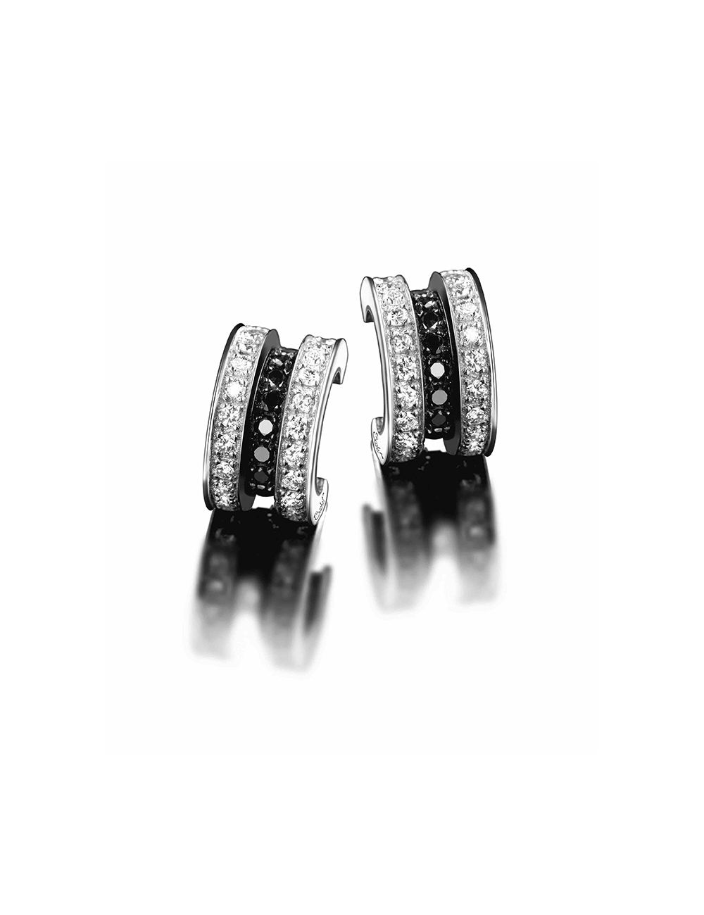 Contrasting elegance: D.Bachet hoops with black and white diamonds in white gold.