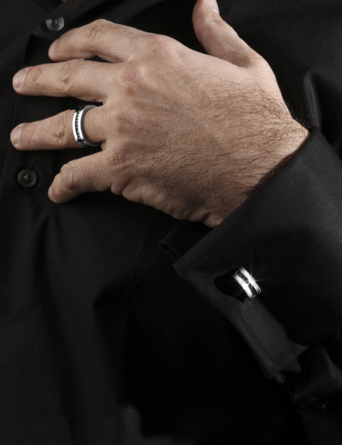 Luxurious Charmeur signet ring in platinum with black diamonds for men, timeless elegance.