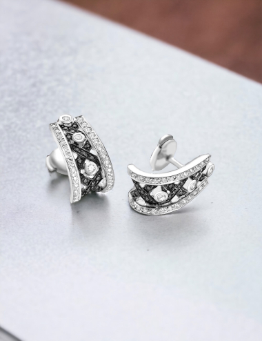 D.Bachet's BlackLight Rock earrings with black and white diamonds, a symbol of boldness.