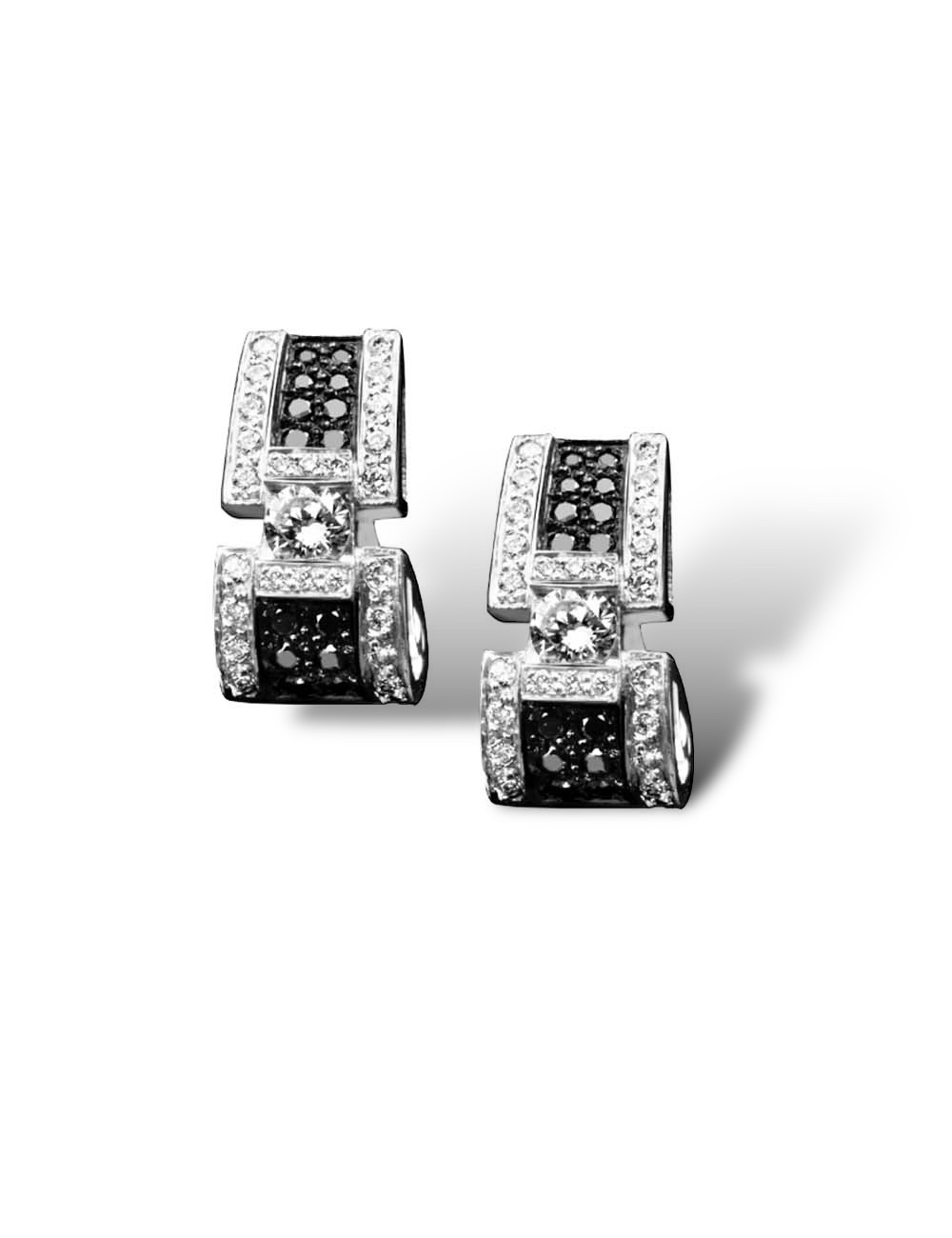 White gold earrings with black and white diamonds for timeless luxury.