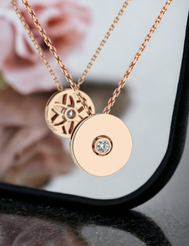 Women's rose gold necklace with white diamonds, featuring a flower of life design, perfect for an elegant look.