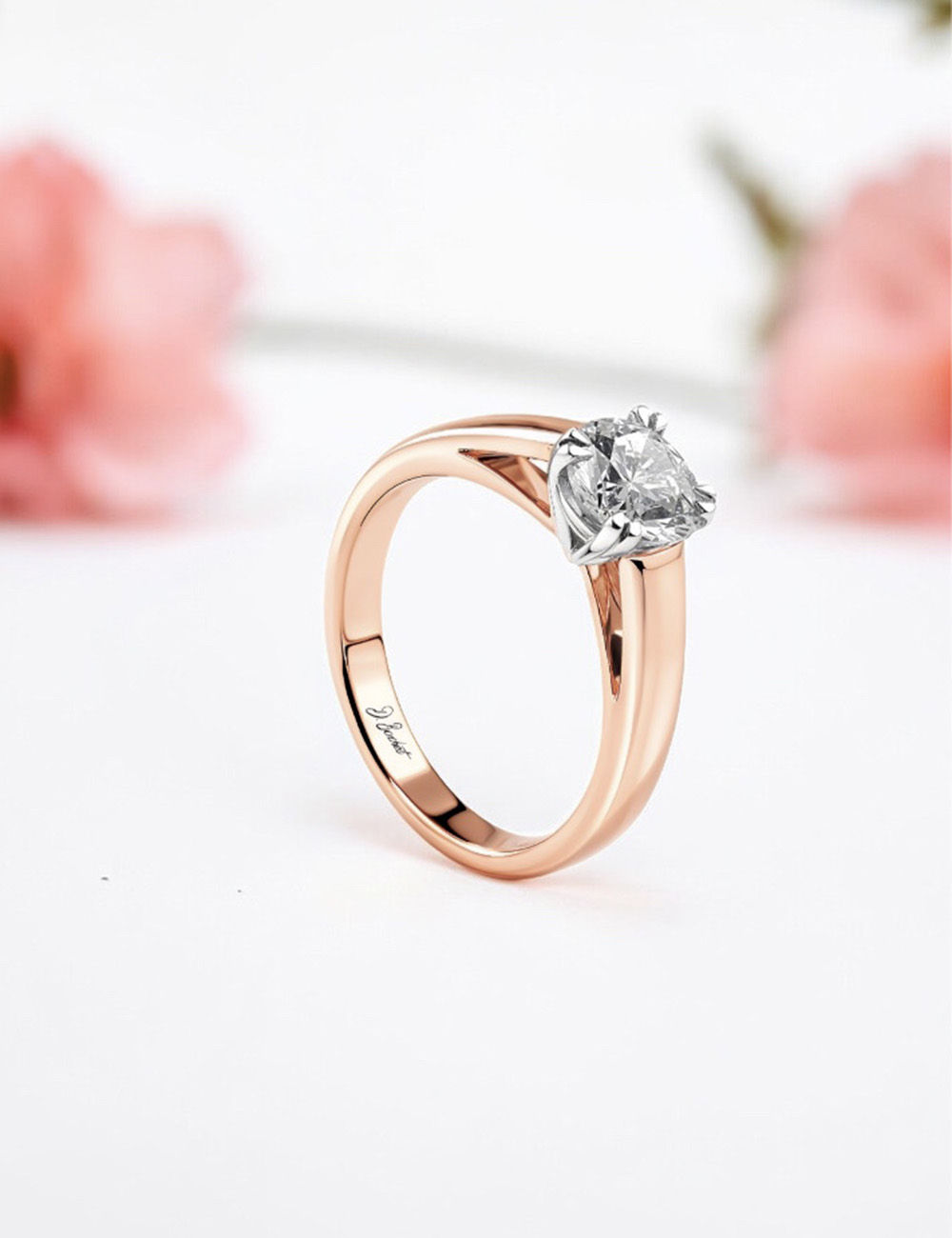 Rose gold engagement ring, modern solitaire 0.50 carat, sleek setting, Maison D.Bachet.