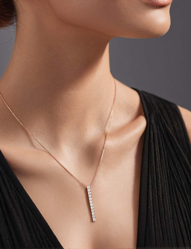 Rose gold Millésime pendant with 12 white diamonds, a symbol of life's precious moments, handcrafted in France.