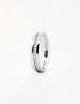 Women's platinum wedding ring with white diamonds, lower-level grain setting, luminous and sculptural bridal jewelry.