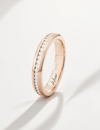 Rose gold wedding ring set with white diamonds, an elegant D.Bachet creation.
