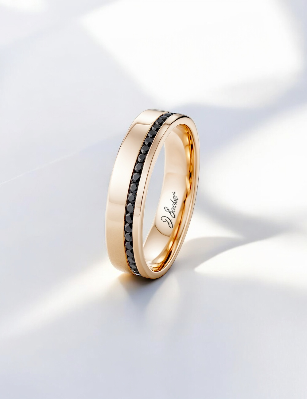 Men’s wedding band in 18k rose gold set with black diamonds, modern and refined design by D.Bachet.