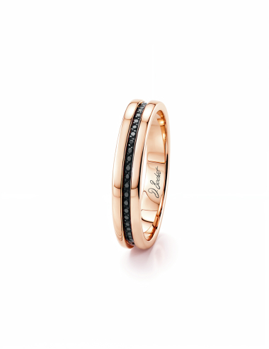 Bague en or rose D.Bachet, création artisanale, diamant central, style moderne et intemporel.