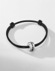 Men’s bracelet in 18k white gold, black diamonds, with adjustable black cord. Elegant and bold.