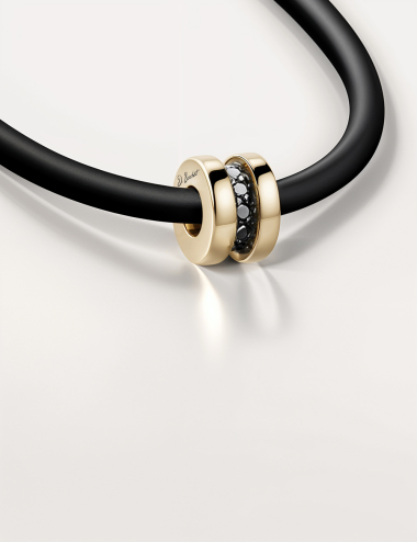 Yellow gold men’s necklace, black diamonds, with sleek black cord and matching gold clasp.