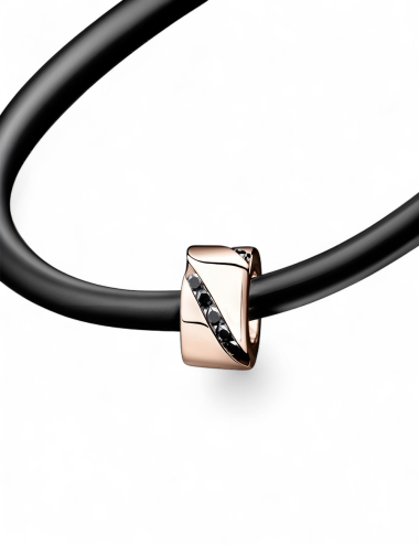 Rose gold necklace for men, set with black diamonds, on black cord and gold clasp.
