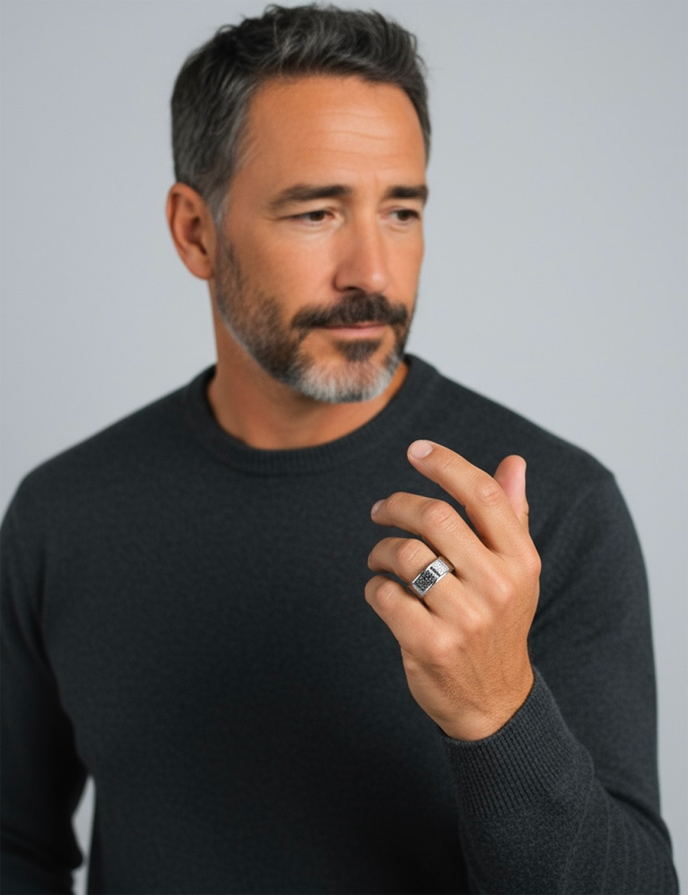 Men’s platinum signet ring Audacieux, set with white and black diamonds, a contemporary D.Bachet jewelry creation.