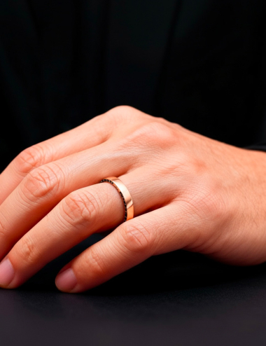 Men's wedding band, diamonds set on edges, sleek and contemporary design.