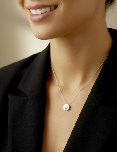 Round white gold pendant with diamond, pure brilliance and architectural D.Bachet design.