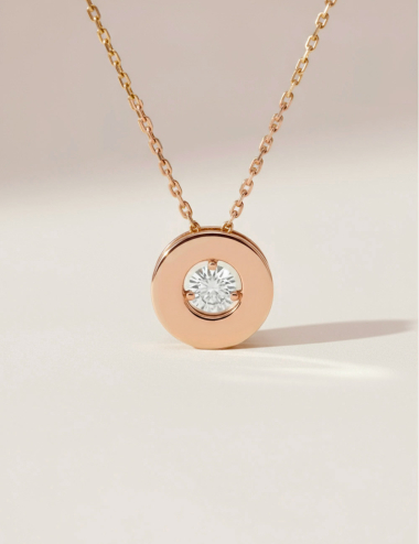 Collier en or rose avec diamant flottant, design moderne et délicat signé D.Bachet.