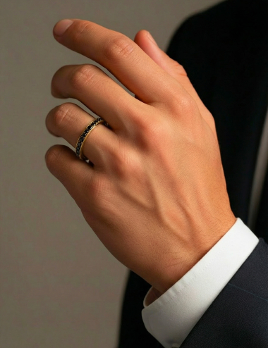 Men's yellow gold wedding band set with black diamonds, bright modern style.