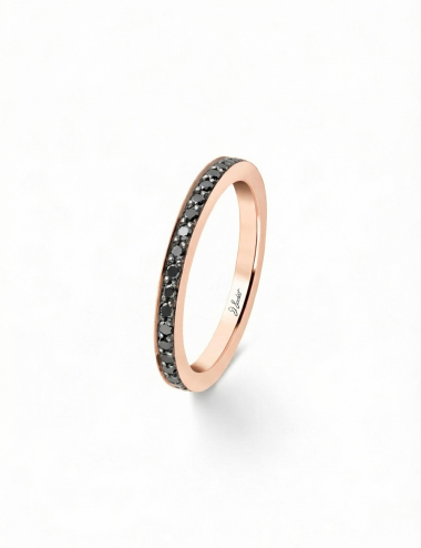 Rose gold women’s wedding ring set with black diamonds, sleek contemporary style.