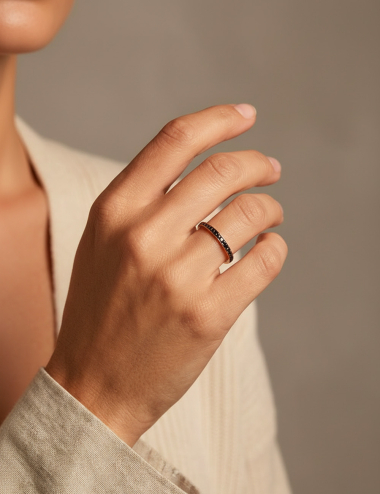 Rose gold women’s wedding ring set with black diamonds, sleek contemporary style.