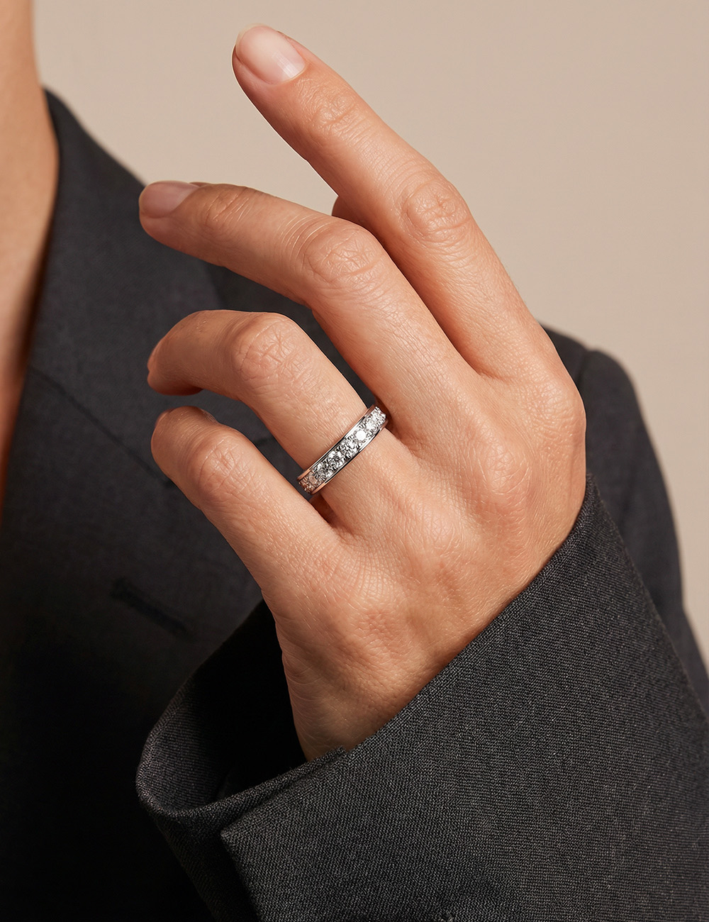 Platinum wedding band for women set with natural white diamonds.