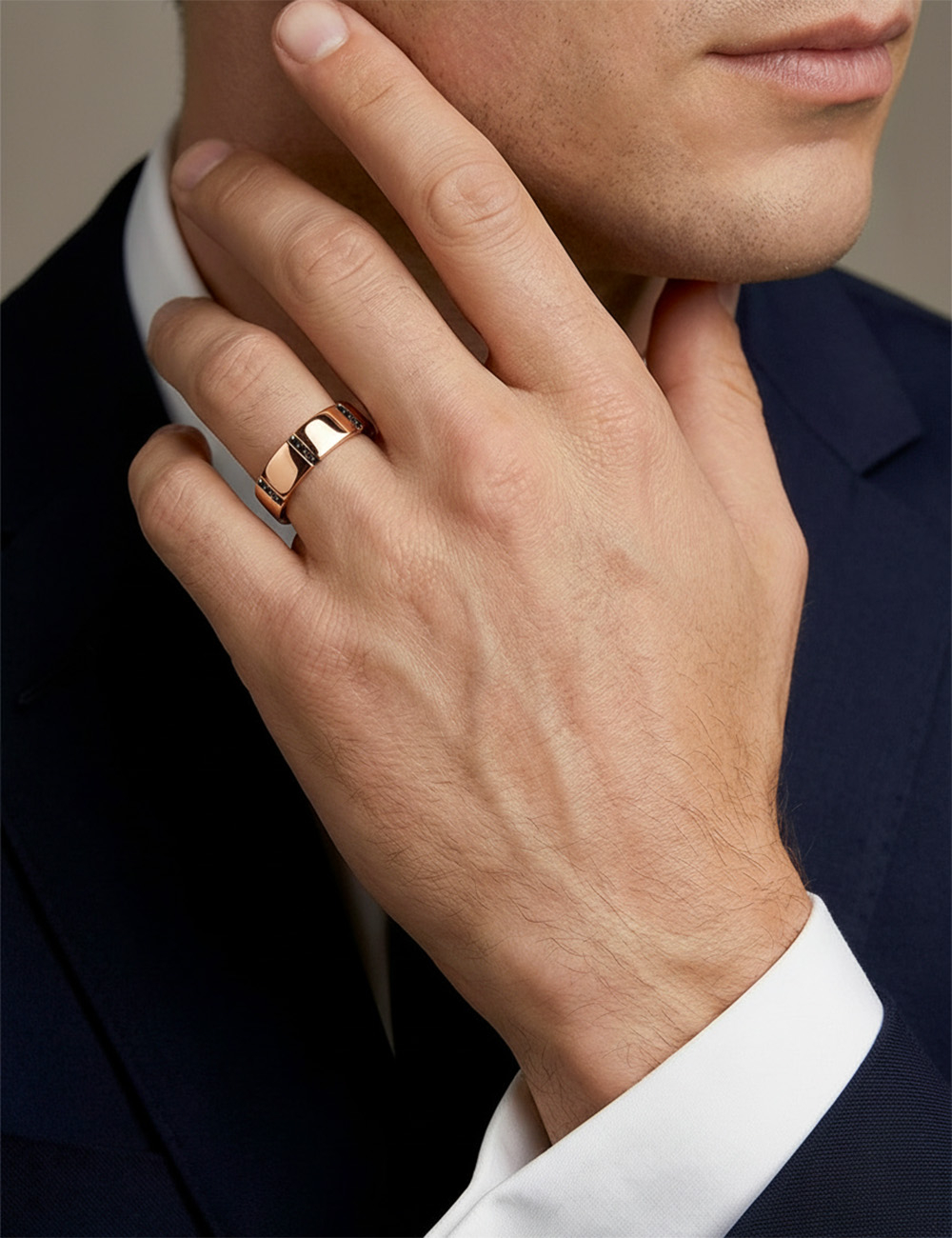 Rose gold 6 mm men’s modern wedding ring with integrated black diamond details.
