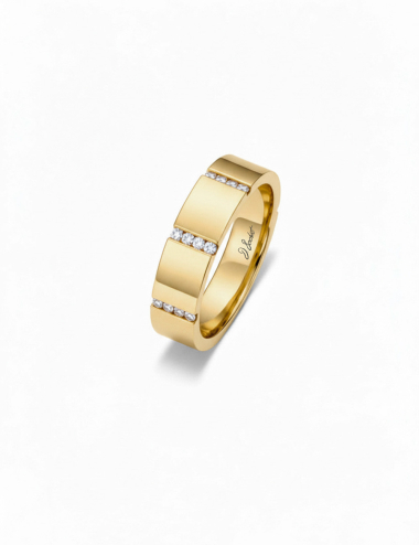 Bridge to Unity wedding band in yellow gold with a graphic design and white diamonds.