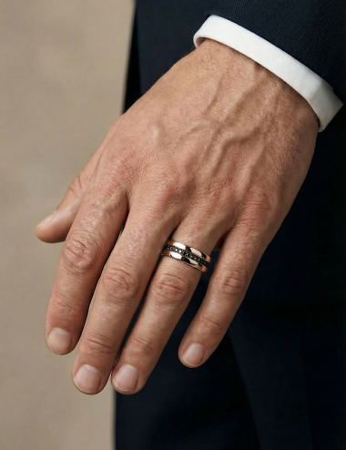 Men’s 7 mm rose gold wedding band with black diamonds, contemporary masculine design for everyday wear.