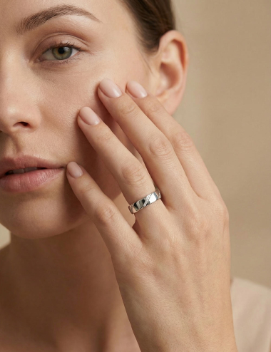 Women’s wedding band set with white diamonds in a diagonal pattern all around the ring.