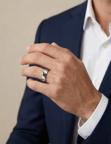 Men’s platinum wedding band with black diamonds set diagonally.