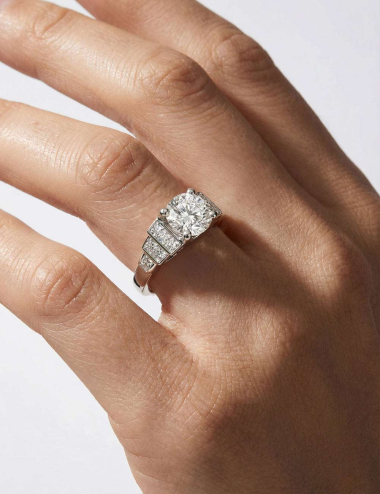 Art Deco Empire engagement ring in platinum and natural white diamonds.