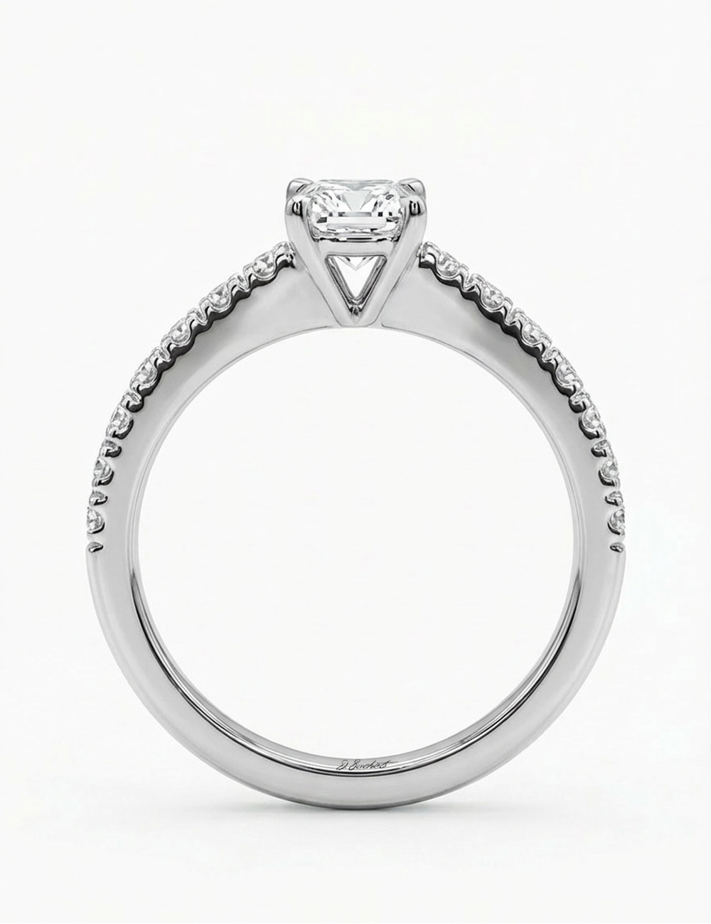 Platinum engagement ring with a 0.50 carat center diamond and seven white diamonds, modern and timeless design.